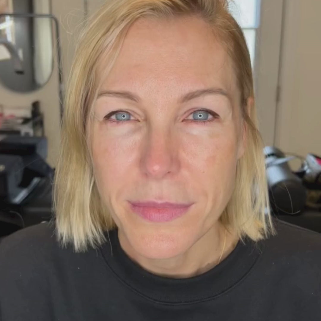 Healed permanent eyeliner on a woman with fair skin and hooded eyes. The soft wing adds a lifted look, and the pigment blends into the lash line for a clean finish.