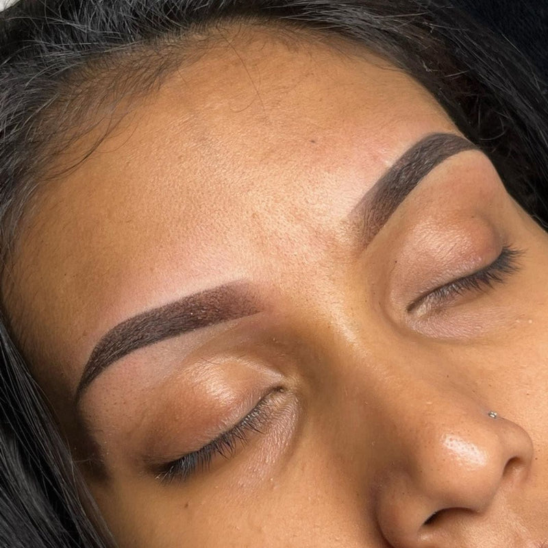 Close-up of a person with well-groomed powder eyebrows. Service performed at SKN Deep Cosmetic Clinic in Grimsby