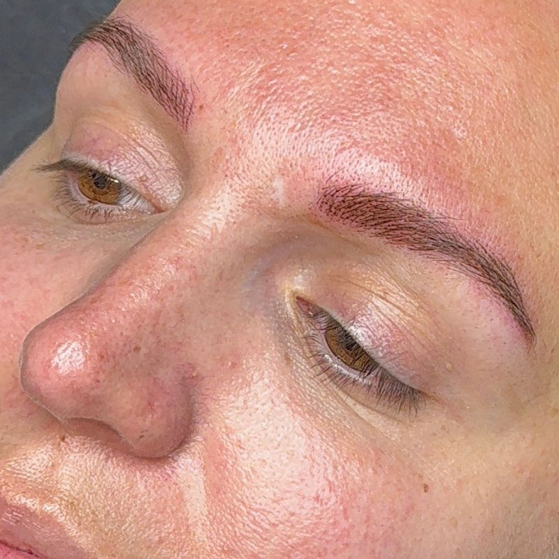 Close-up of a woman's face showing nano brows results adding lift and symmetry to sparse brows. Service performed at SKN Deep Cosmetic Clinic in Grimsby.