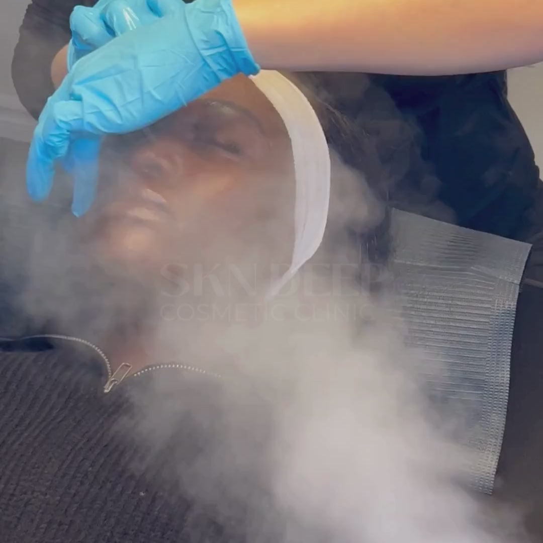 Person receiving buccal facial massage with intraoral technique for lymphatic drainage at SKN Deep Cosmetic Clinic.